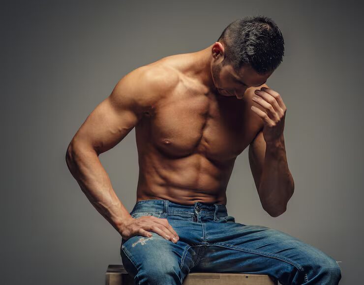 shirtless-muscular-man-denim-jeans-isolated-grey-background_613910-7399